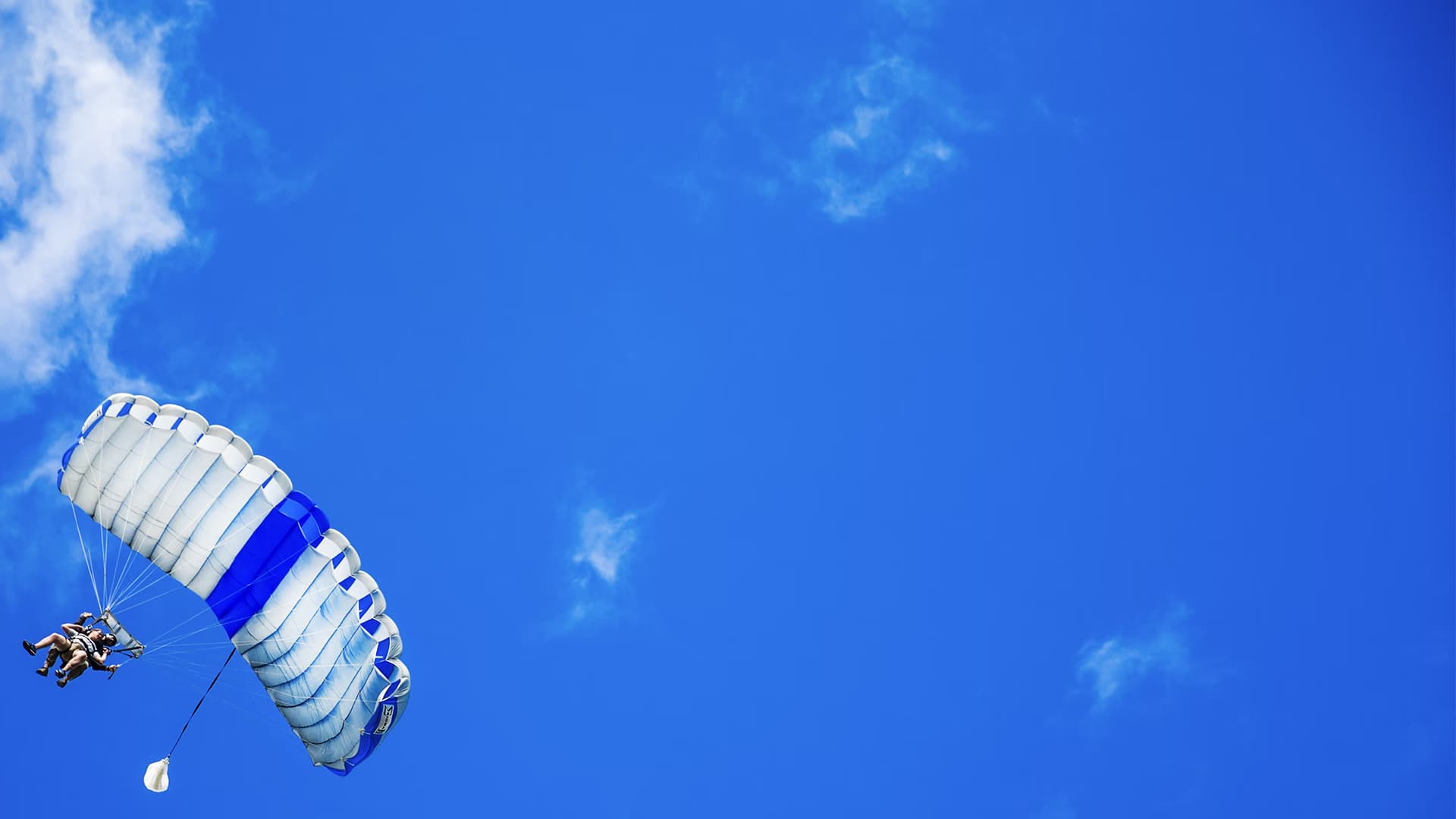 Blue sky with paraglider