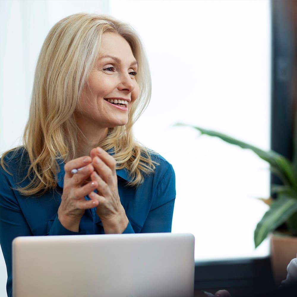 Senior business woman smiling